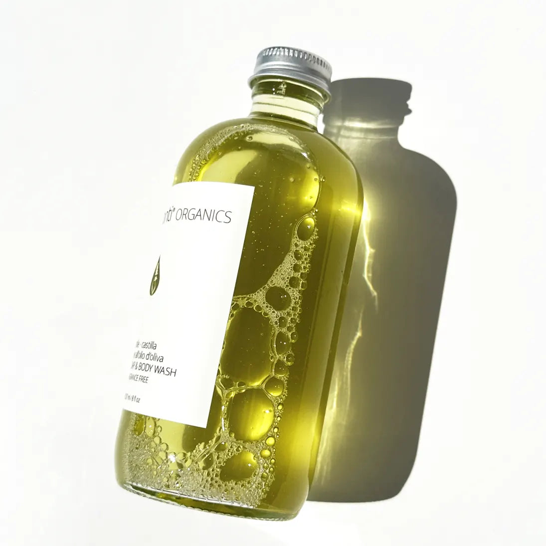 BY VALENTI bottle of liquid castile soap on a white background